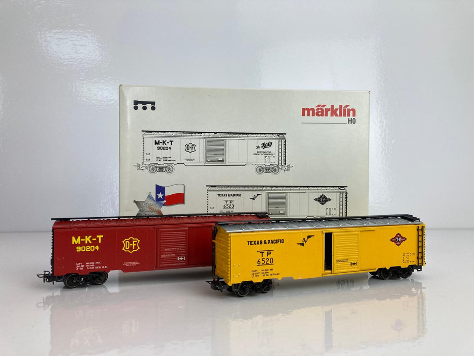 Märklin 4579 - 2 x Amerikaanse Boxcars - "Texas and Pacific" (T&P)