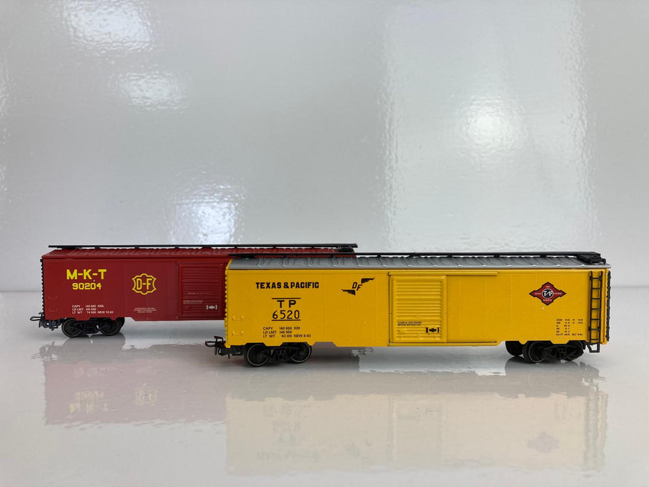 Märklin 4579 - 2 x Amerikaanse Boxcars - "Texas and Pacific" (T&P)